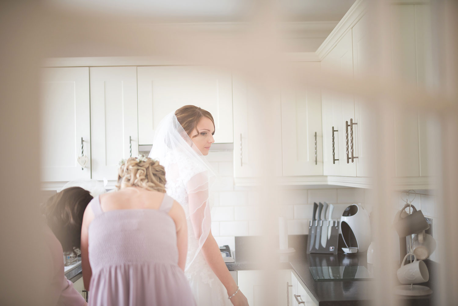 newbury berkshire mill hall wedding photographer bride getting ready in kitchen