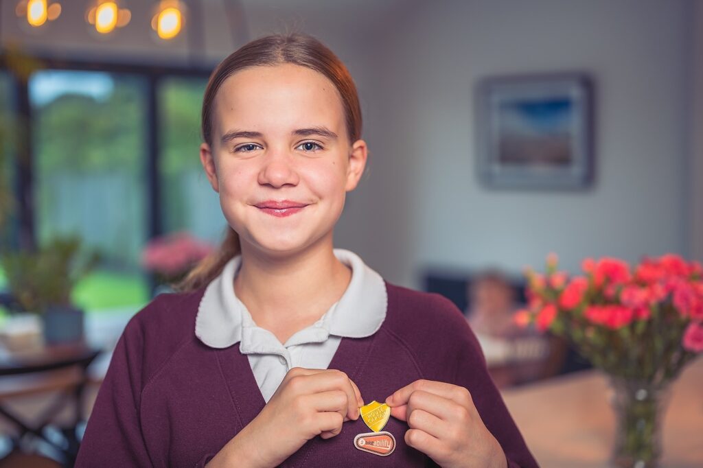 Thea happy with new House Captain &amp; Bike Ability badges for year 6 🙂

#housecaptain #badges #bikeability #proud #portrait #portraitphotography #kitchen #home #portraits #smile #happy #family #nikon #50mm #nikonuk #nikon50mm18 #newbury #berkshire #photographer